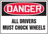 ALL DRIVERS MUST CHOCK WHEELS