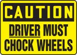 DRIVER MUST CHOCK WHEELS