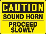 Safety Sign, Header: CAUTION, Legend: SOUND HORN PROCEED SLOWLY