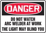 DO NOT WATCH ARC WELDER AT WORK THE LIGHT MAY BLIND YOU
