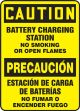 Safety Sign, Header: CAUTION/PRECAUCIÓN, Legend: BATTERY CHARGING STATION NO SMOKING OR OPEN FLAMES (BILINGUAL-SPANISH)