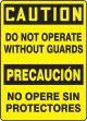 Safety Sign, Header: CAUTION/PRECAUCIÓN, Legend: CAUTION DO NOT OPERATE WITHOUT GUARDS (BILINGUAL)