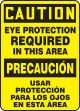 CAUTION EYE PROTECTION REQUIRED IN THIS AREA (BILINGUAL - SPANISH)