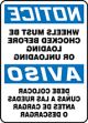 NOTICE WHEELS MUST BE CHOCKED BEFORE LOADING OR UNLOADING (BACKWARDS) (BILINGUAL SPANISH)