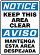 NOTICE KEEP THIS AREA CLEAR (BILINGUAL SPANISH)