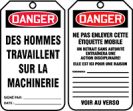 DANGER DES HOMMES TRAVAILLENT SUR LA MACHINERIE