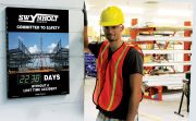 Paradigm Shift hero image. Man standing next to Digi-Day sign