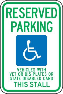 (WISCONSIN) RESERVED PARKING VEHICLES WITH VET OR DIS PLATES OR STATE DISABLED CARDS THIS STALL (W/GRAPHIC)