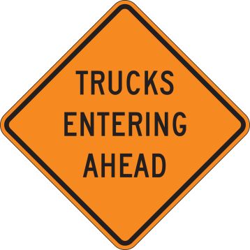 TRUCKS ENTERING AHEAD