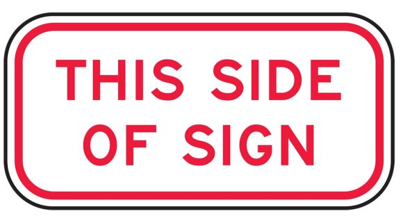 THIS SIDE OF SIGN