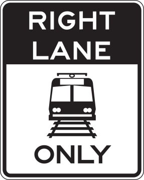 _____ LANE ONLY (TRAM / TRAIN SYMBOL)