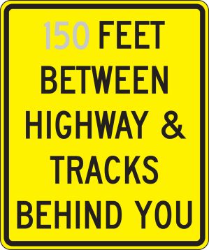 __ FEET BETWEEN HIGHWAY & TRACKS BEHIND YOU