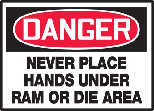 NEVER PLACE HANDS UNDER RAM OR DIE AREA