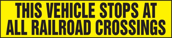 THIS VEHICLE STOPS AT ALL RAILROAD CROSSINGS