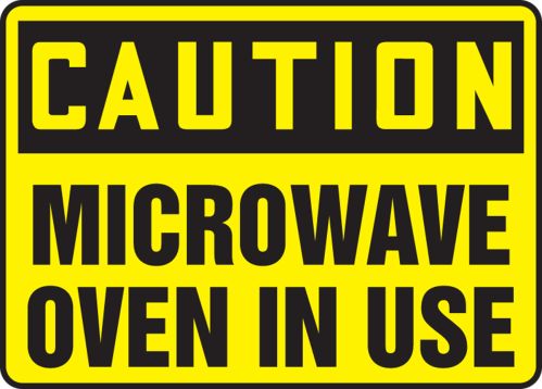 MICROWAVE OVEN IN USE