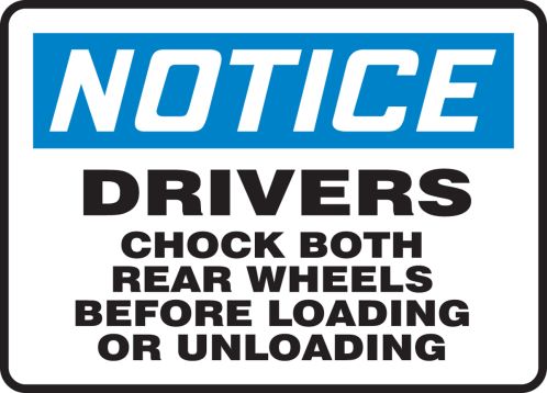 DRIVERS CHOCK BOTH REAR WHEELS BEFORE LOADING OR UNLOADING
