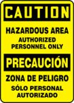 CAUTION HAZARDOUS AREA AUTHORIZED PERSONNEL ONLY (BILINGUAL SPANISH)