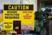 OSHA Caution Decibel Meter Sign With Ear Plug Dispenser