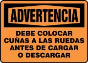 Safety Sign, Header: WARNING, Legend: WARNING CHOCK WHEELS BEFORE LOADING AND UNLOADING