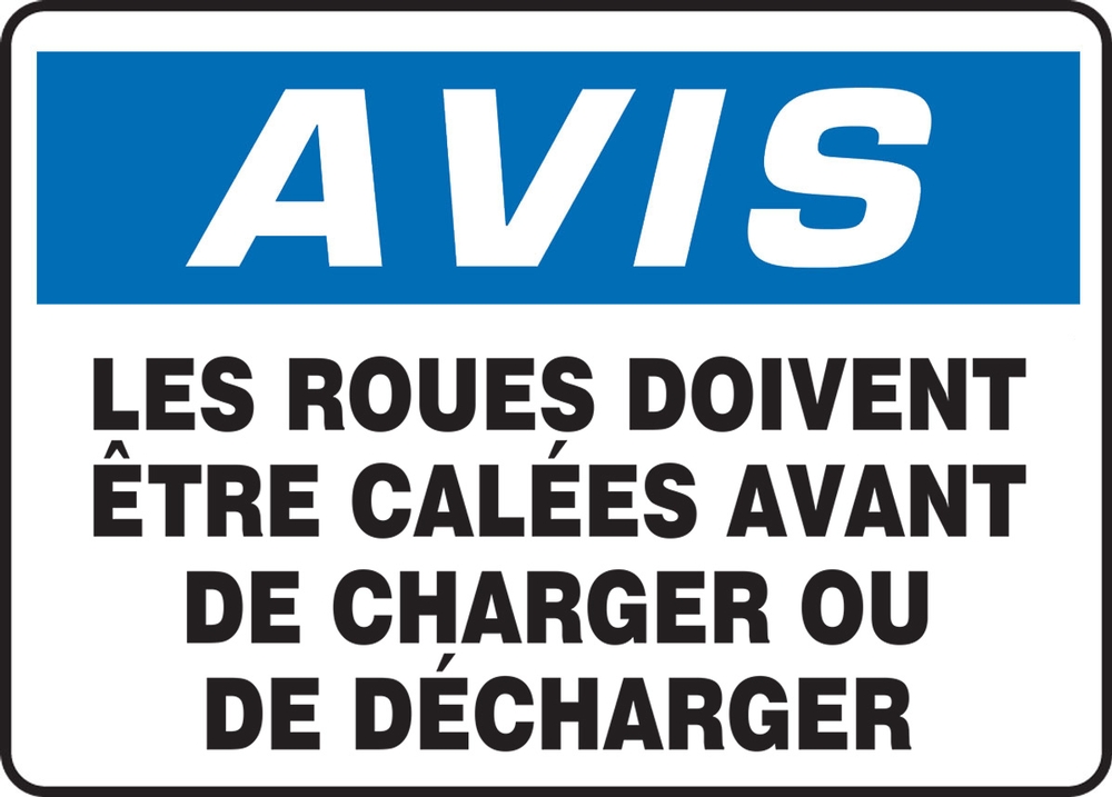 Safety Sign, Header: NOTICE, Legend: NOTICE WHEELS MUST BE CHOCKED BEFORE LOADING OR UNLOADING