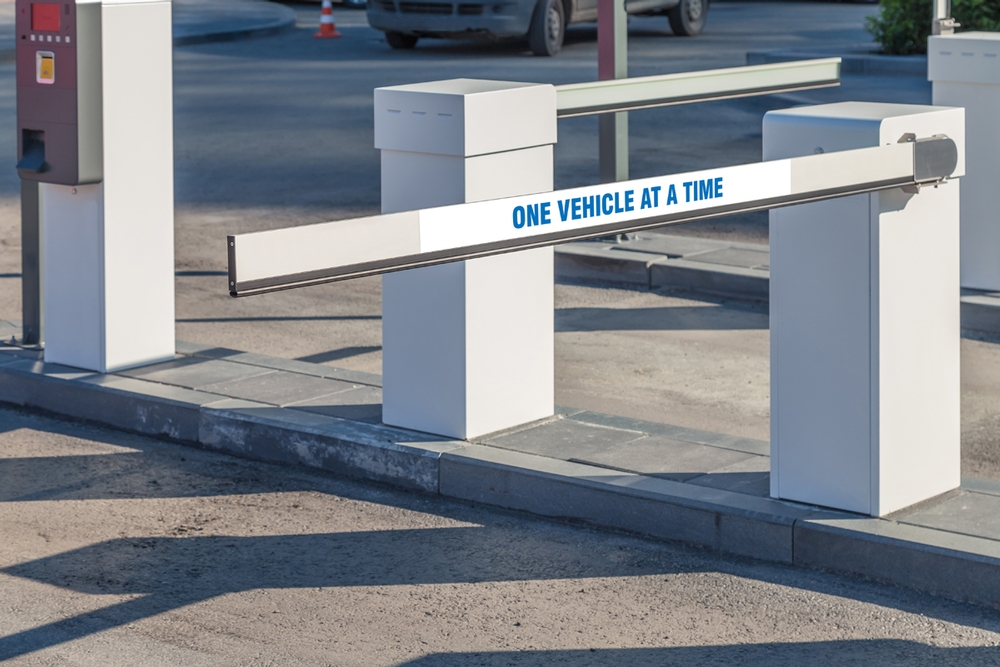 Gate Arm Sign: One Vehicle At A Time