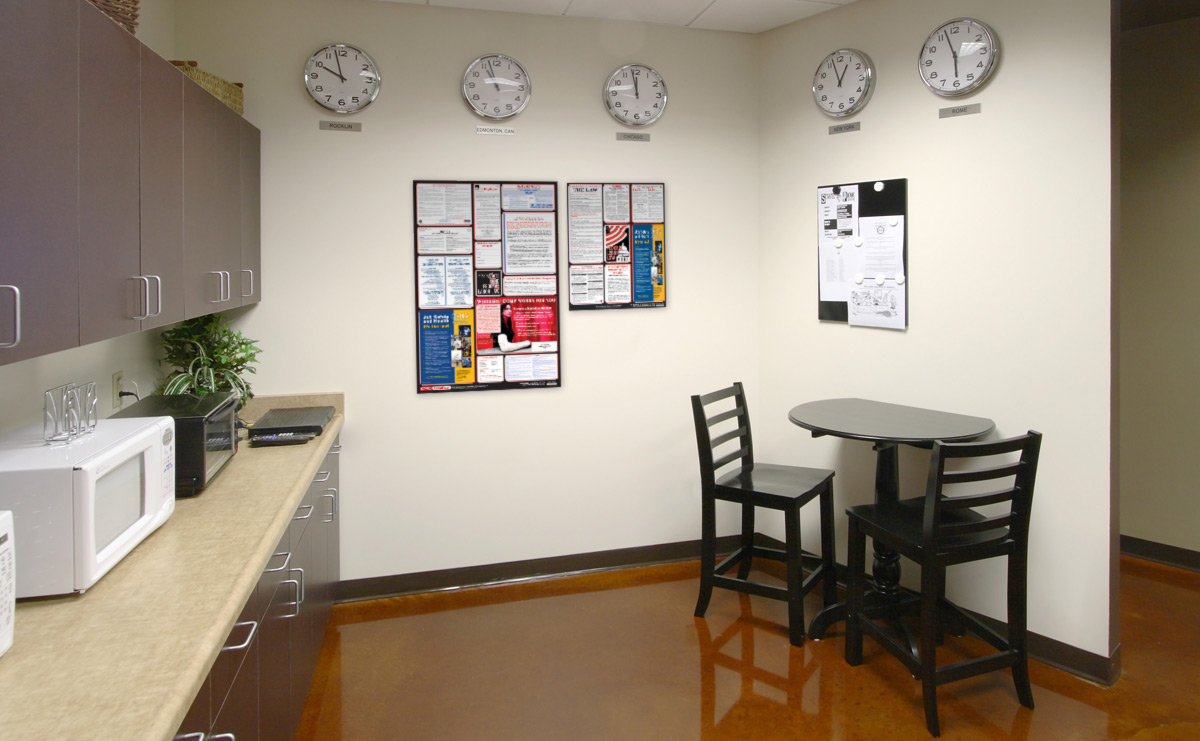 Accuform Signs labor law poster hanging in a kitchen