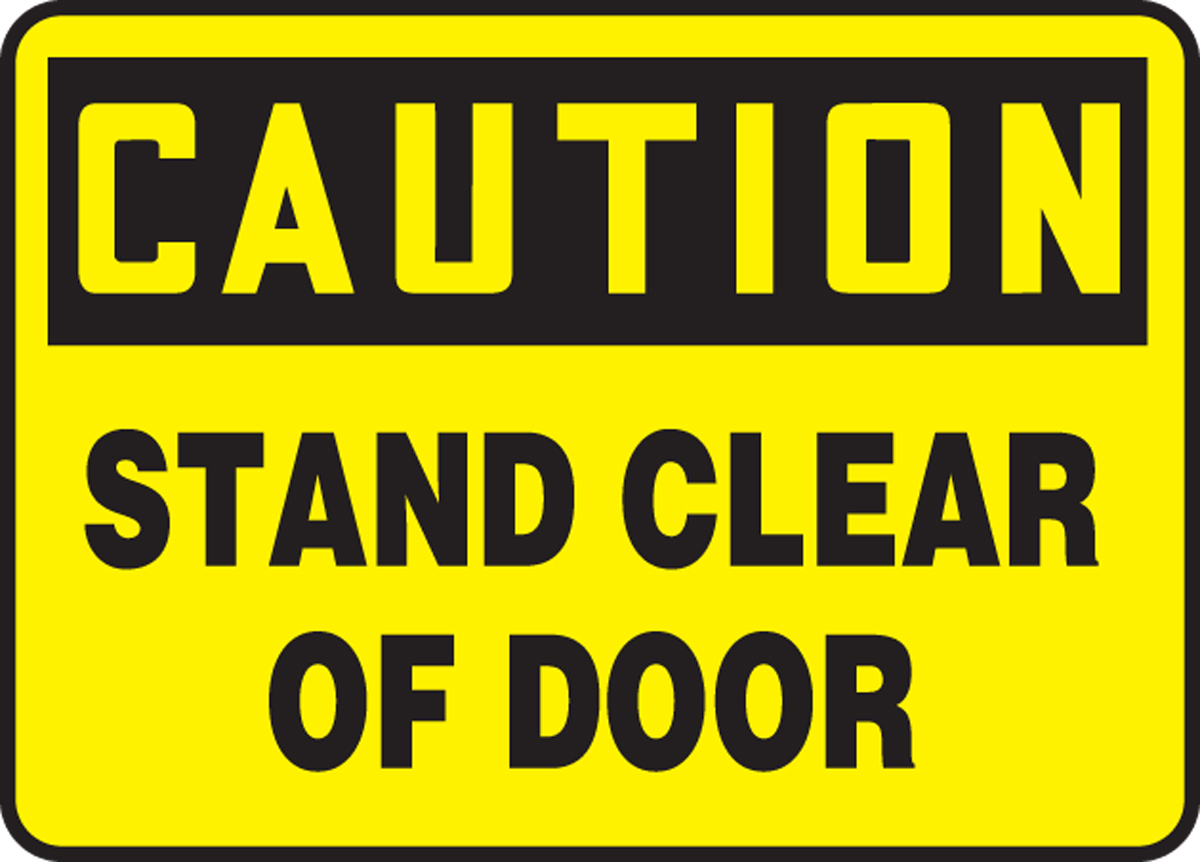 Stand clear. Stand Clear of the Blast Door. Keep Clear of the Door. Caution work sign.