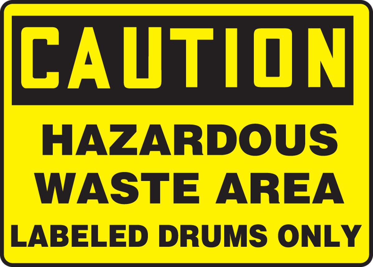 HAZARDOUS WASTE AREA LABELED DRUMS ONLY