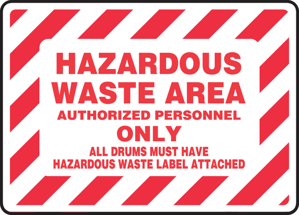 AUTHORIZED PERSONNEL ONLY ALL DRUMS MUST HAVE HAZARDOUS WASTE LABEL ATTACHED