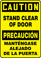 CAUTION STAND CLEAR OF DOOR (BILINGUAL SPANISH)