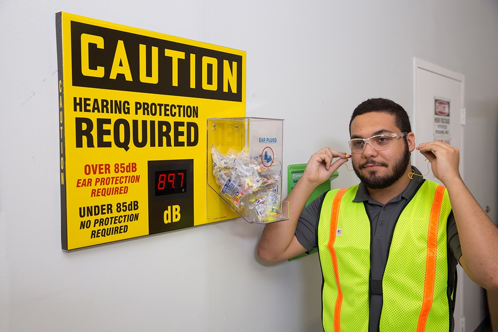 OSHA Caution Decibel Meter Sign With Ear Plug Dispenser