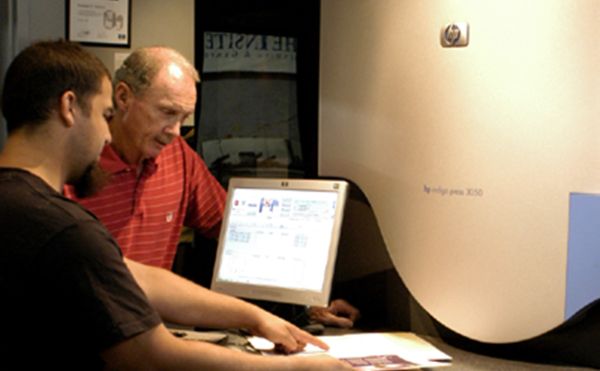 Digital printing image of workers at printer