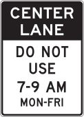 Lane Guidance Sign: Center Lane - Do Not Use 7-9 AM Mon-Fri