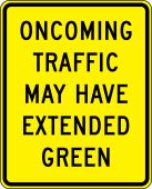Intersection Sign: Oncoming Traffic May Have Extended Green