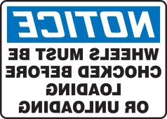 OSHA Notice Safety Sign: (Backwards) Wheels Must Be Chocked Before Loading Or Unloading