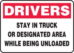 Drivers Safety Sign: Stay In Truck Or Designated Area While Being Unloaded